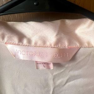 Victoria’s Secret sleep shirt. Pink silk button up